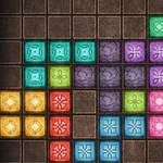 Bloques de colores organizados en un patrón dentro de una cuadrícula en un fondo marrón