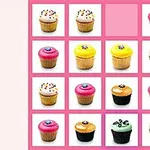Una cuadrícula de 4x4 con cupcakes de varios colores, incluyendo rosa, amarillo, blanco con chispas y uno decorado con lazo verde