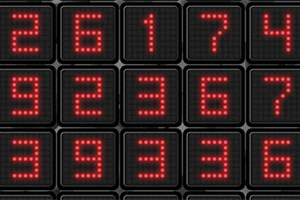Cuadrícula de números rojos en una pantalla digital negra