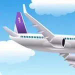 Avión volando en un cielo azul con nubes esponjosas