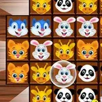 Tablero de juego con fichas de animales sonrientes como pandas, conejos y jirafas en una cuadrícula