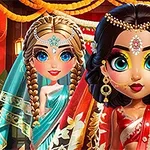 Dos muñecas estilizadas con maquillaje vibrante y vestimenta tradicional adornada con joyas y colores brillantes, en un entorno decorado festivamente