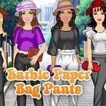 Cuatro muñecas de moda con sombreros y pantalones estilo paper bag posan en la calle