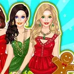 Tres mujeres vestidas de gala con atuendos navideños en rojo y verde, rodeadas de adornos festivos