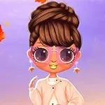 Personaje animado con gafas grandes y labios dorados, rodeado de hojas de otoño sobre un fondo degradado