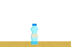 Botella de agua azul sobre un piso de madera con fondo blanco