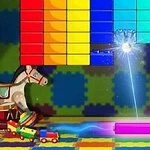 Bloques de colores brillantes en filas con un rayo de luz en el centro, un caballo de juguete y un camión en la parte inferior