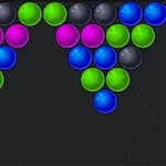 Burbujas de colores verde, azul, negro y rosa organizadas en forma triangular sobre un fondo oscuro