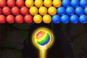 Bolas de colores rojas, amarillas y azules alineadas en la parte superior con una esfera arcoíris brillante en el centro inferior