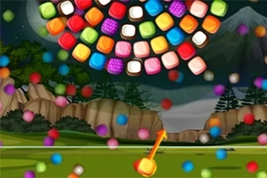 Colores brillantes de esferas y cubos en un paisaje nocturno con montañas y árboles de fondo