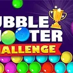 Título colorido que dice Bubble Shooter Challenge con un trofeo dorado y burbujas de colores en el fondo