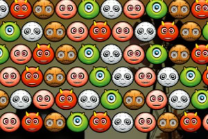 Emojis de caras de varios colores dispuestos en filas sobre un fondo oscuro con siluetas de árboles