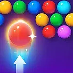 Bolas de colores brillantes agrupadas en la parte superior de la imagen con una pelota roja iluminada en el centro, sobre un fondo azul y una flecha hacia arriba
