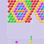 Una pantalla de juego con múltiples burbujas de colores organizadas en filas y un apuntador para lanzar burbujas