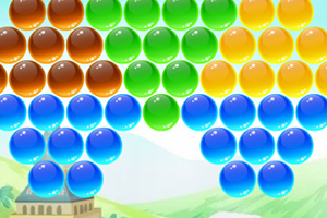 Burbuja de colores dispuestas en filas sobre un fondo de paisaje