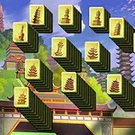 Fichas con imágenes de pagodas alineadas en una estructura diagonal sobre un fondo de templos y vegetación en un paisaje asiático