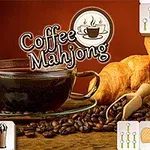 Una taza de café sobre granos de café, acompañada de croissants y utensilios de cocina