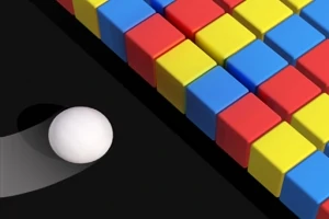 Pelota blanca acercándose a una pared de bloques de colores rojo, amarillo y azul sobre un fondo negro