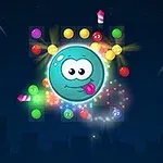 Personaje azul sonriente con lengua afuera rodeado de luces y bolas de colores sobre un fondo oscuro