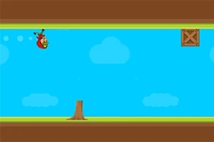Un personaje volador rojo con un casco está orbitando un tocón en un escenario con un cielo azul y nubes, y una caja de madera se encuentra en la esquina superior derecha