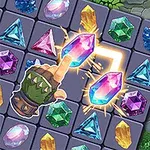 Un tablero de juego con gemas coloridas y una mano señalando dos gemas brillantes conectadas por un destello, sobre un fondo de piedra y vegetación