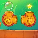 Una criatura verde con grandes ojos se encuentra en una plataforma junto a dos cañones naranjas y dos estrellas brillantes sobre un fondo verde