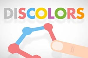 La imagen muestra la palabra DISCOLORS en letras de colores sobre un fondo blanco, con un dedo interactuando con una figura geométrica
