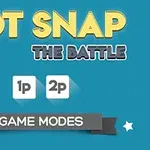 Texto amarillo y azul sobre un fondo azul que dice Dot Snap The Battle con opciones 1p y 2p y una cinta gris con Game Modes