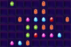 Una cuadrícula oscura con casillas que contienen esferas brillantes de varios colores como verde, naranja, rosa, azul y rojo