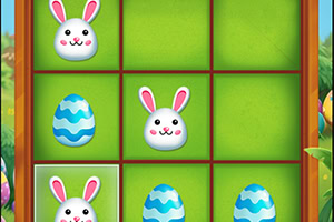 Conejitos y huevos de Pascua azules en un tablero de cuadrículas verdes