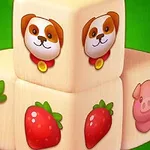 Cubos con ilustraciones de un perro, una zanahoria, una fresa y un cerdo sobre un fondo verde
