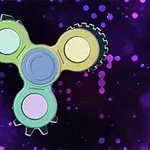 Un spinner con engranajes de colores sobre un fondo púrpura con puntos brillantes