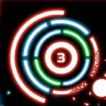 Círculos concéntricos iluminados en azul, verde y rojo con el número tres en su centro, sobre un fondo negro