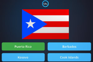 Cuatro banderas diferentes de países en un fondo gris