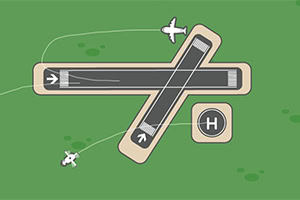 Pista de aterrizaje en un campo verde con dos aviones en ruta y una plataforma de helicópteros