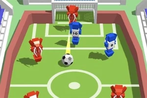 Jugadores de futbol en forma de bloques rojos y azules frente a una portería en un campo de juego con un balón en el centro