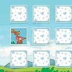 Una cuadrícula de cartas boca abajo con un conejo y rana ilustrados, sobre un fondo de paisaje natural