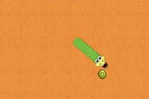 Un gusano verde animado con ojos grandes se dirige hacia una fruta sobre un fondo naranja