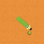 Un gusano verde animado con ojos grandes se dirige hacia una fruta sobre un fondo naranja