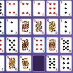 Varias cartas de póker acomodadas en una cuadrícula sobre un fondo morado