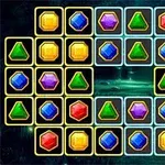 Rejilla de gemas coloridas en forma de hexágonos, triángulos y otras figuras geométricas sobre un fondo oscuro