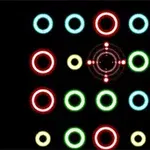 Círculos de colores brillantes dispuestos en una cuadrícula sobre un fondo negro