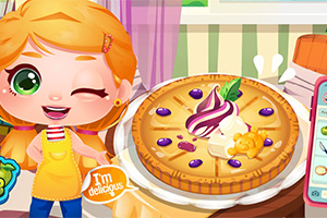 Niña animada guiñando un ojo junto a un pastel decorado con crema y frutas en una cocina colorida