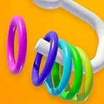 Anillos de colores brillantes en un tubo blanco sobre un fondo amarillo