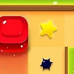 Bloque rojo brillante en un camino con una estrella amarilla y una trampa negra en un entorno de pasto verde