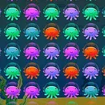 Pulpos de colores brillantes organizados en filas sobre un fondo oscuro
