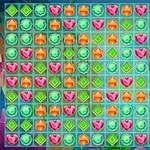 Tablero colorido con gemas en forma de corazones rosas, diamantes verdes, y hexágonos naranjas dispuestas en una cuadrícula