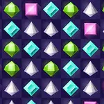 Joyería de varios colores y formas, incluyendo diamantes rosas, azul celeste, verdes y blancos sobre un fondo morado oscuro