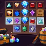 Gemas de diversos colores y formas con un cofre y un barril lleno de joyas en el fondo de una cueva