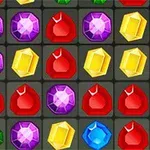Gemas multicolores en una cuadrícula, incluyendo rojas, moradas, amarillas, verdes y azules